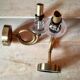 Pair of old brass wall sconces