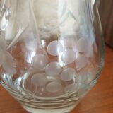 Pitcher decorating grape bunch