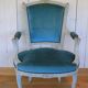 Paire de fauteuils de style Louis XV patinés