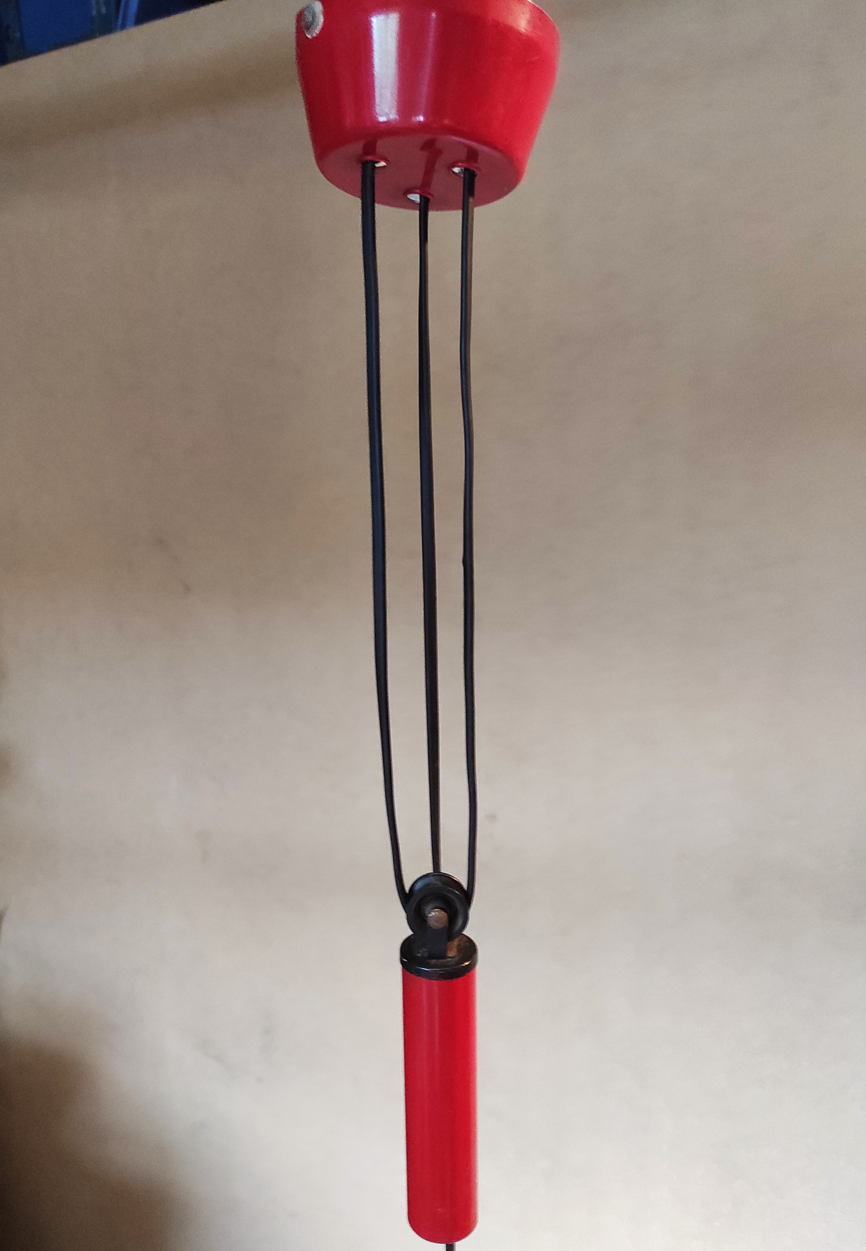 Old Italian vintage suspension rises and falls red 70s