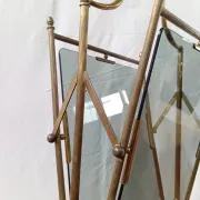 Neo-classical brass magazine rack in the spirit of Maison Jansen.