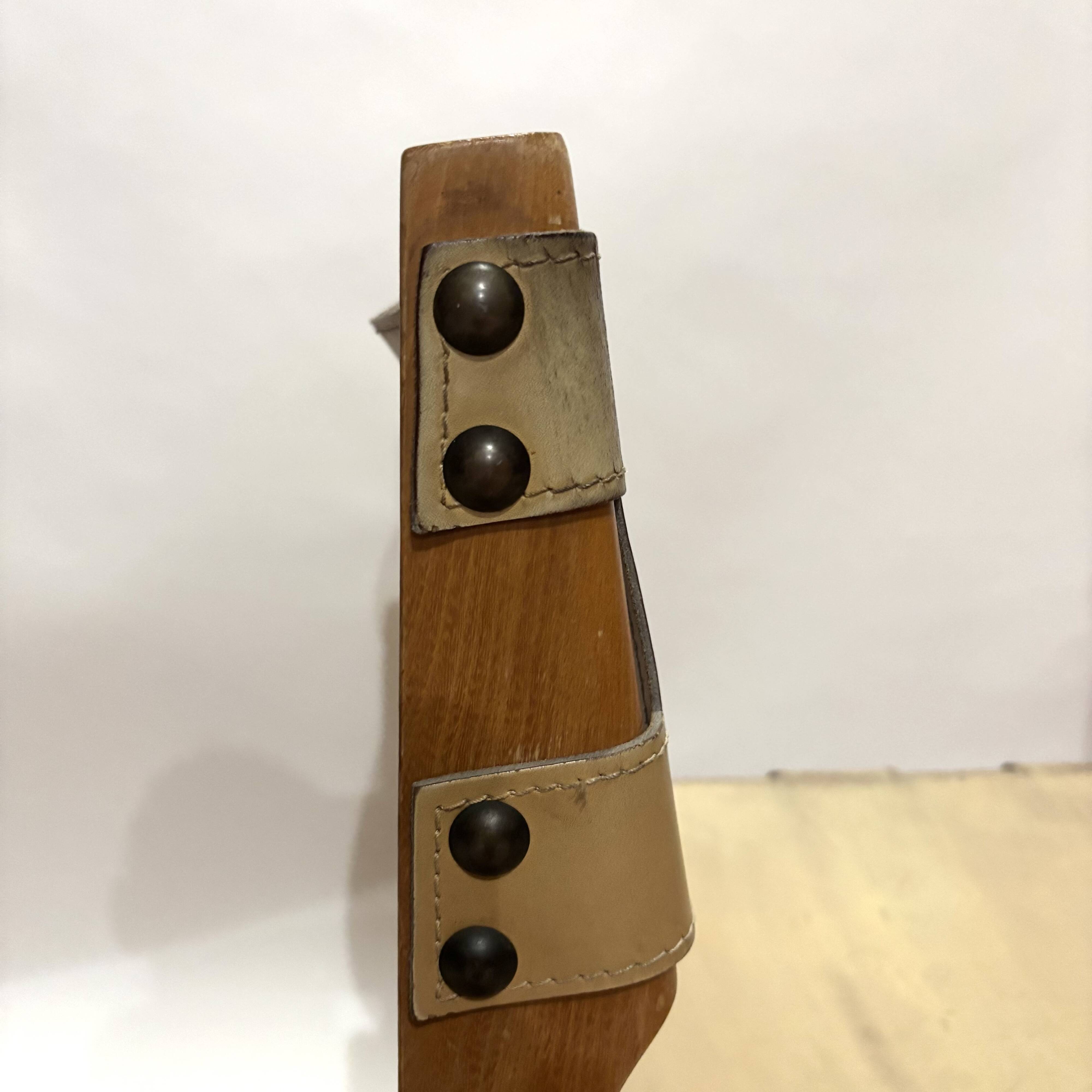 Pair of Maison Regain leather chairs