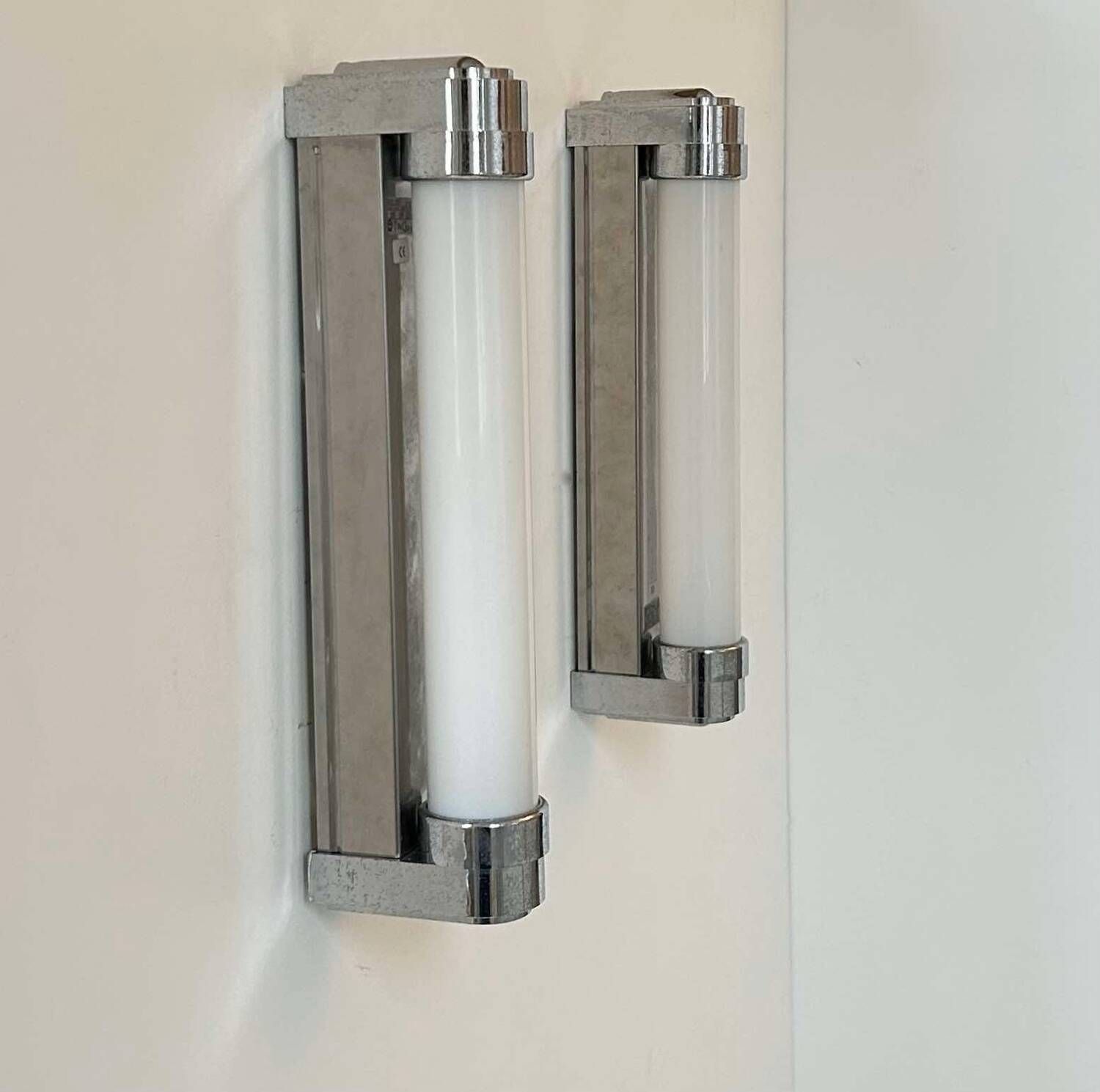 Pair of vintage wall lights, chromed metal, Italy 1970