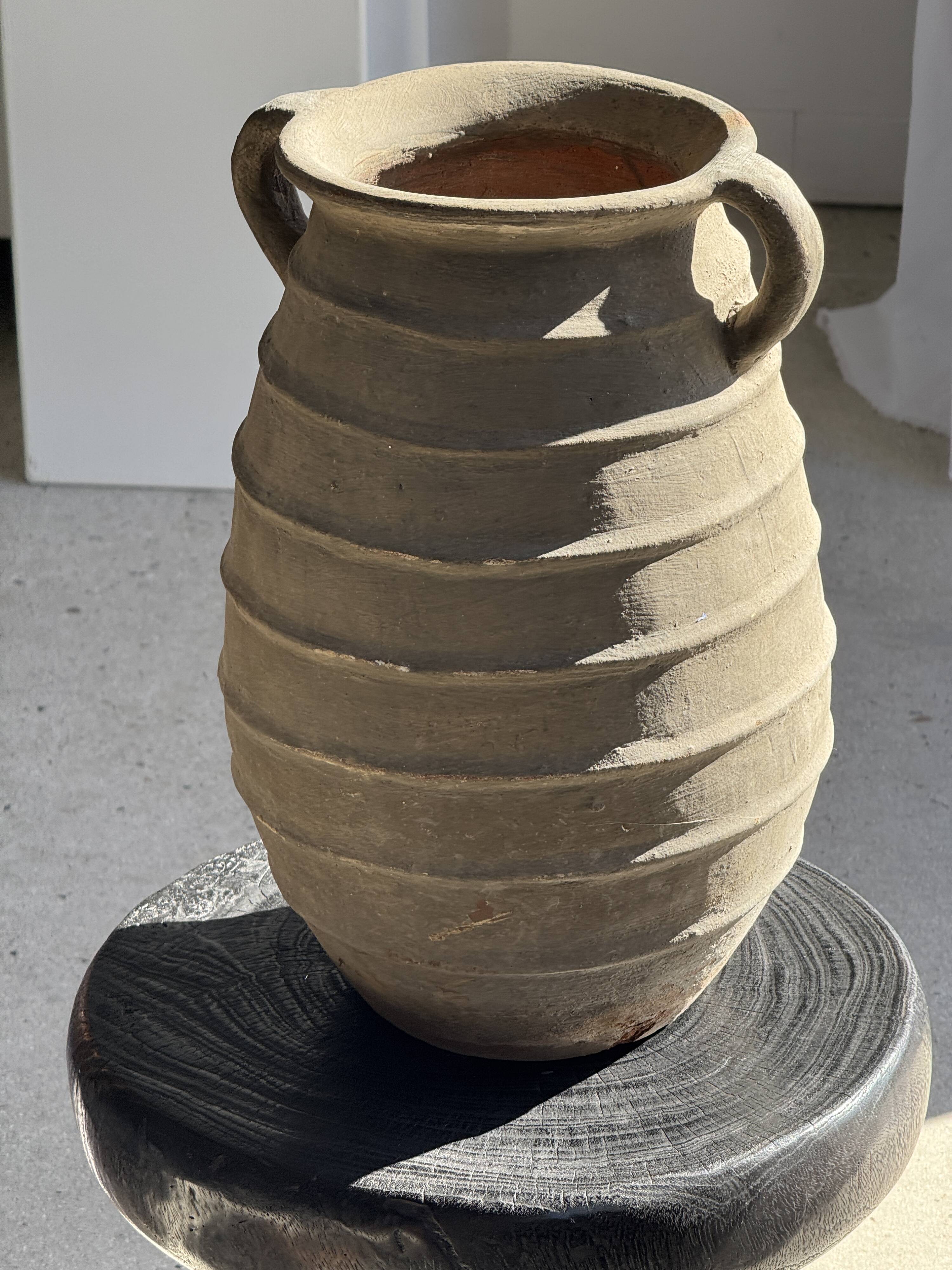 Large oval vase with double handles, featuring raised grey-beige stripes, H42 D28.