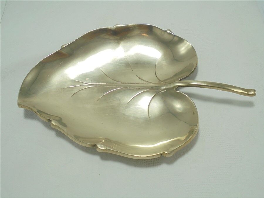 Brass pocket emptier