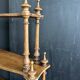 Antique turned wooden shelf with three levels, around 1900.
