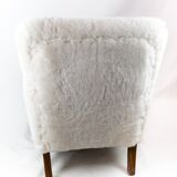 Easy chair newly upholstered with sheep wool and legs of polished wood by Fritz Hansen, 1930s