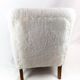 Easy chair newly upholstered with sheep wool and legs of polished wood by Fritz Hansen, 1930s