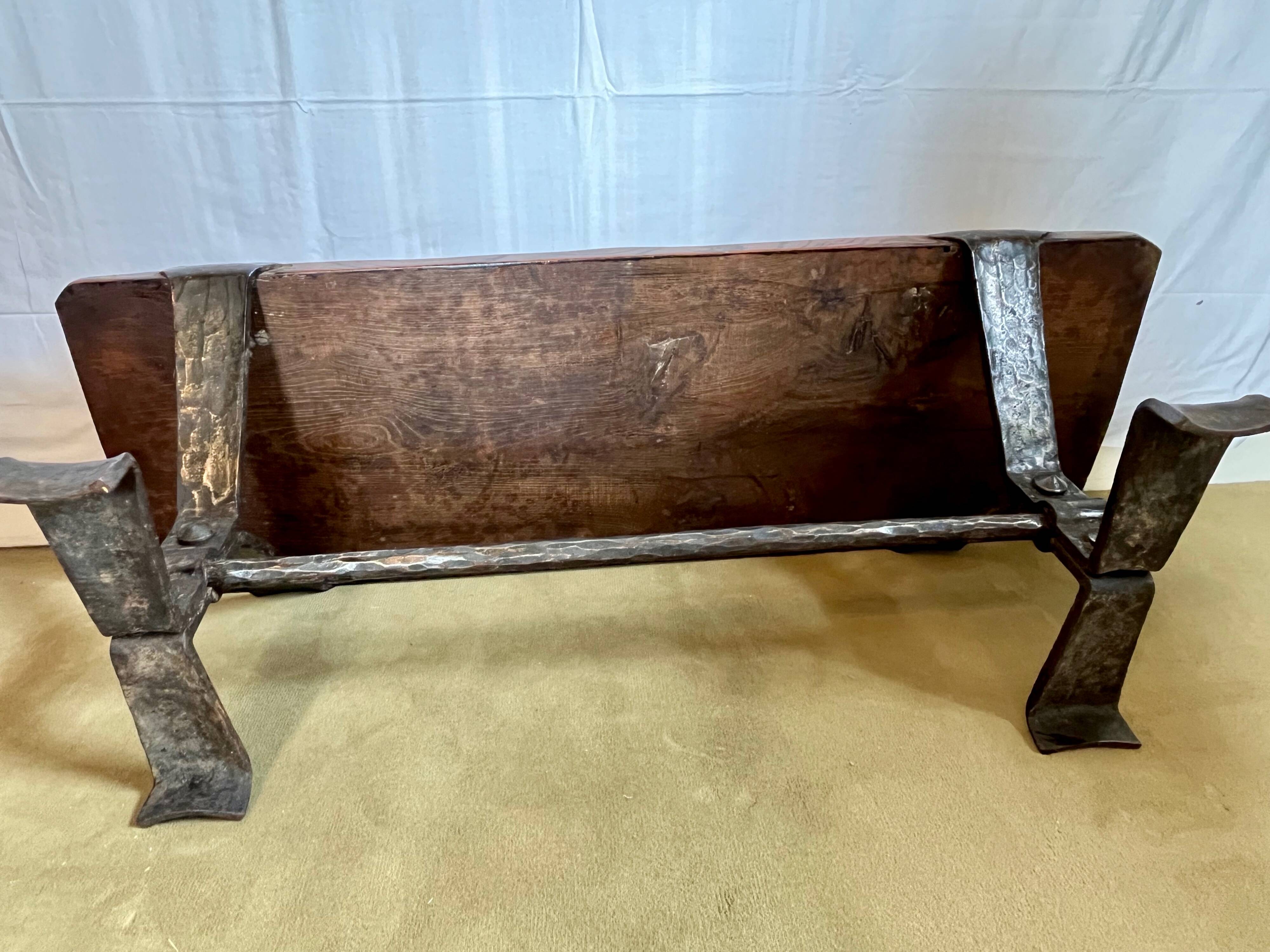 Vintage coffee table in solid wood and wrought iron.