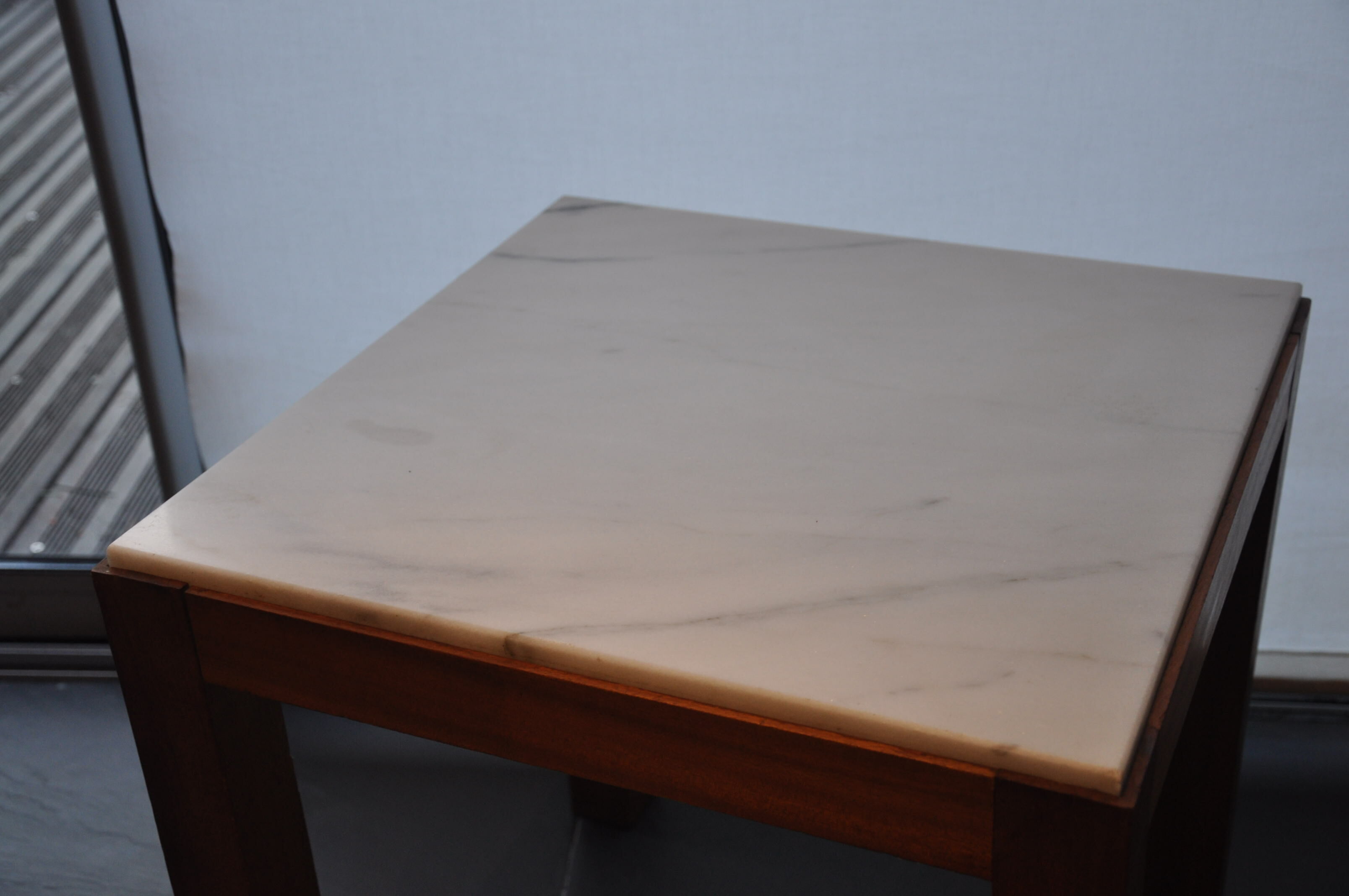 Pair of wooden and marble side tables
