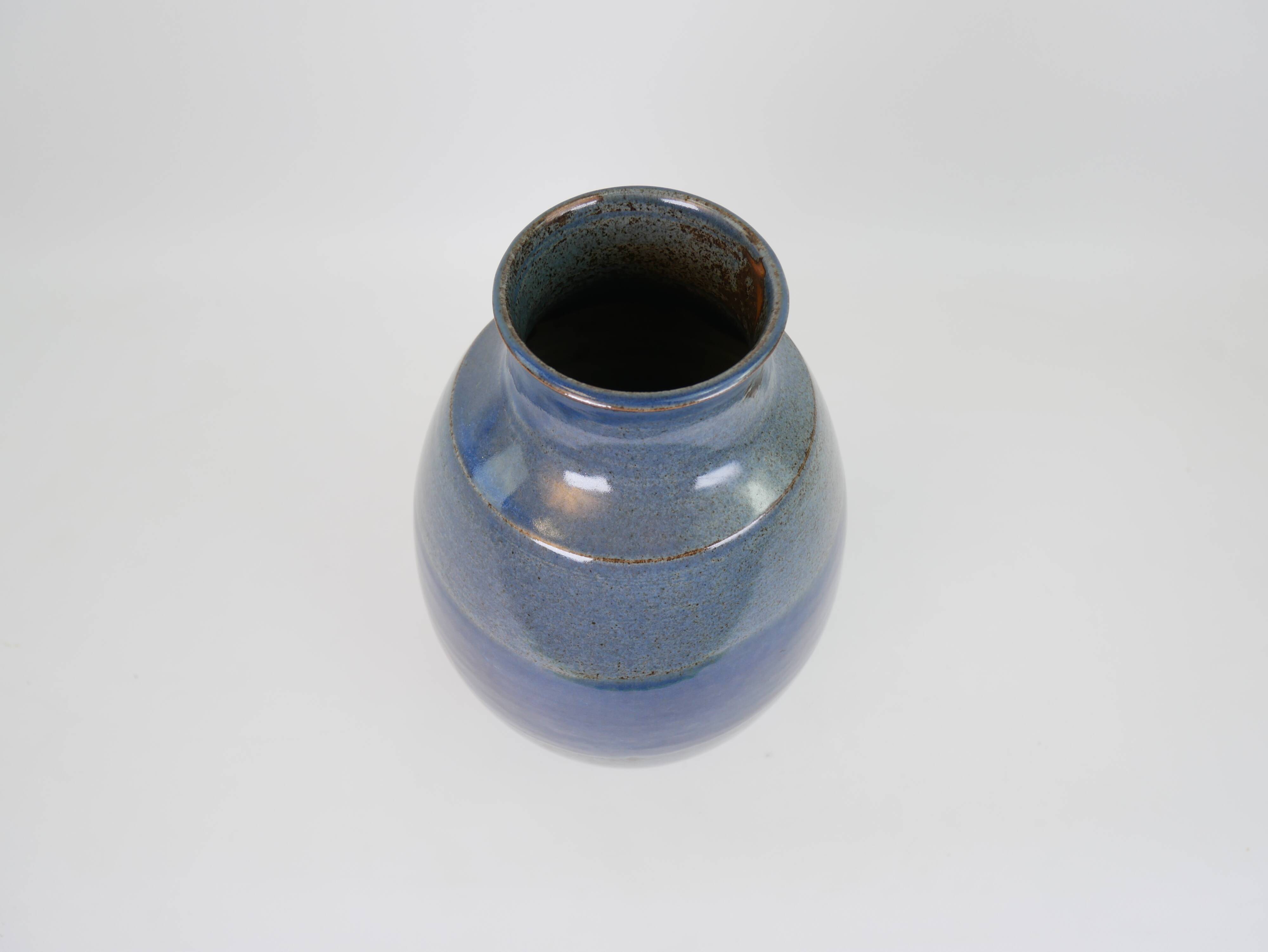 Large blue glazed ceramic vase signed under the base