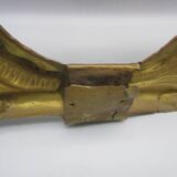 Old ornament in embossed brass - laurel wreath