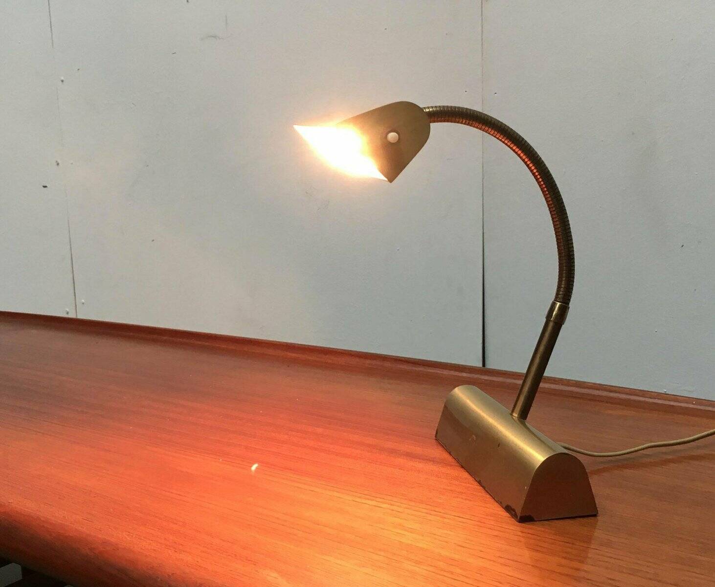 Mid-century brass swan neck table lamp in Hollywood Regency style from the 1960s.
