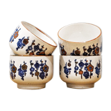 4 tea cups with delicate floral pattern