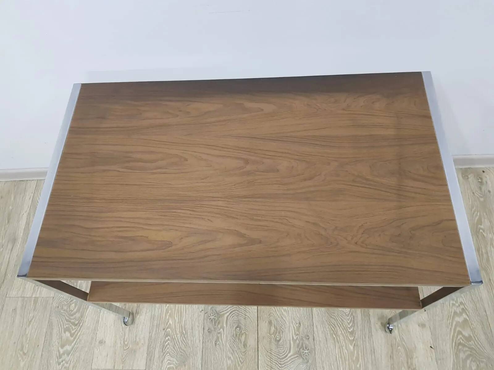Mobile side table, brown, veneer, chrome-plated steel, Germany, 1970s.