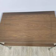 Mobile side table, brown, veneer, chrome-plated steel, Germany, 1970s.