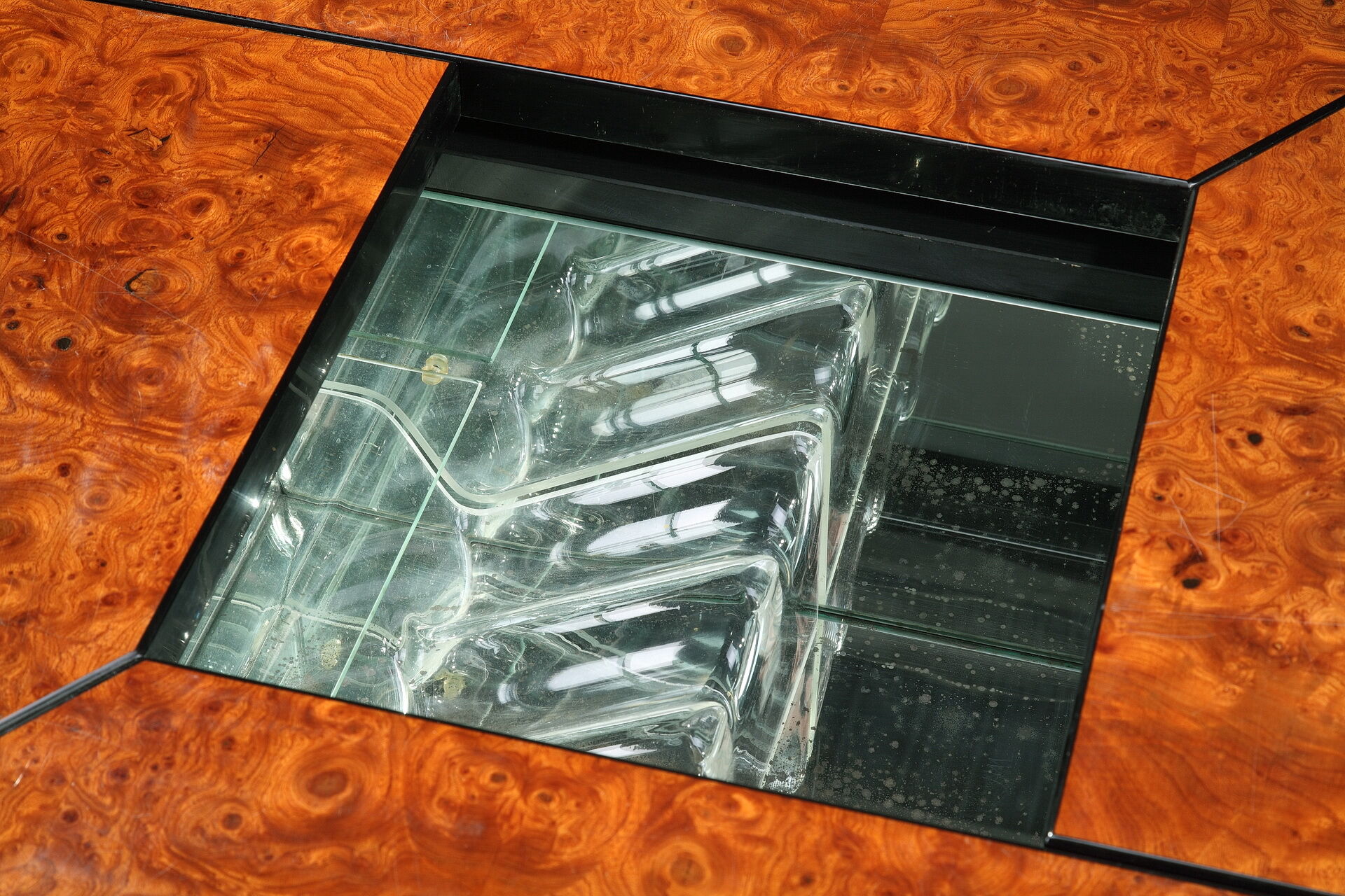 Coffee table in magnifying glass of elm by Paul Michel