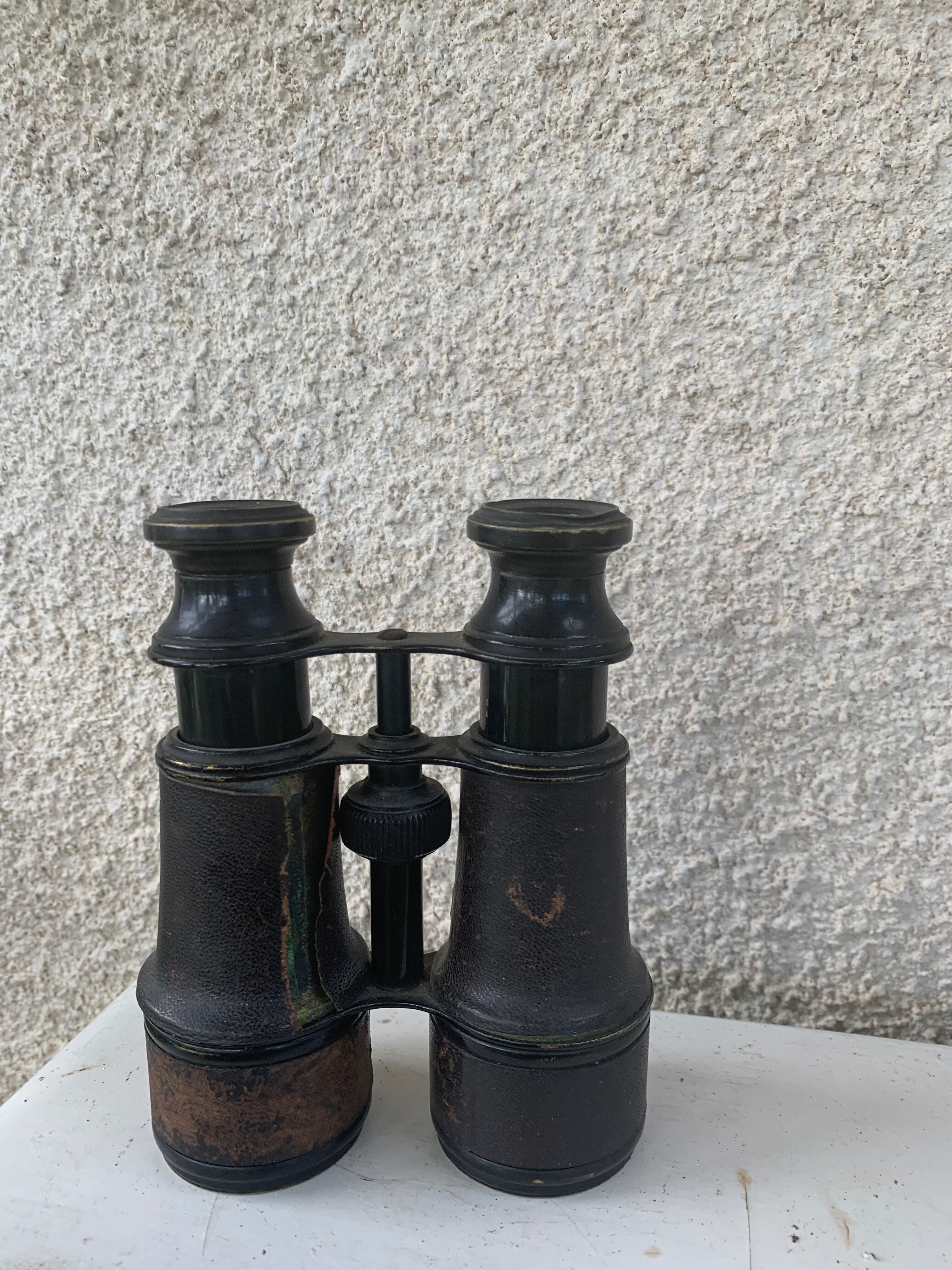 Pair of antique metal binoculars