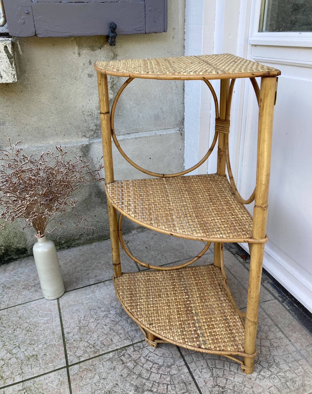 Vintage rattan corner shelf