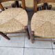 8 vintage straw chairs in the style of Charlotte Perriand.