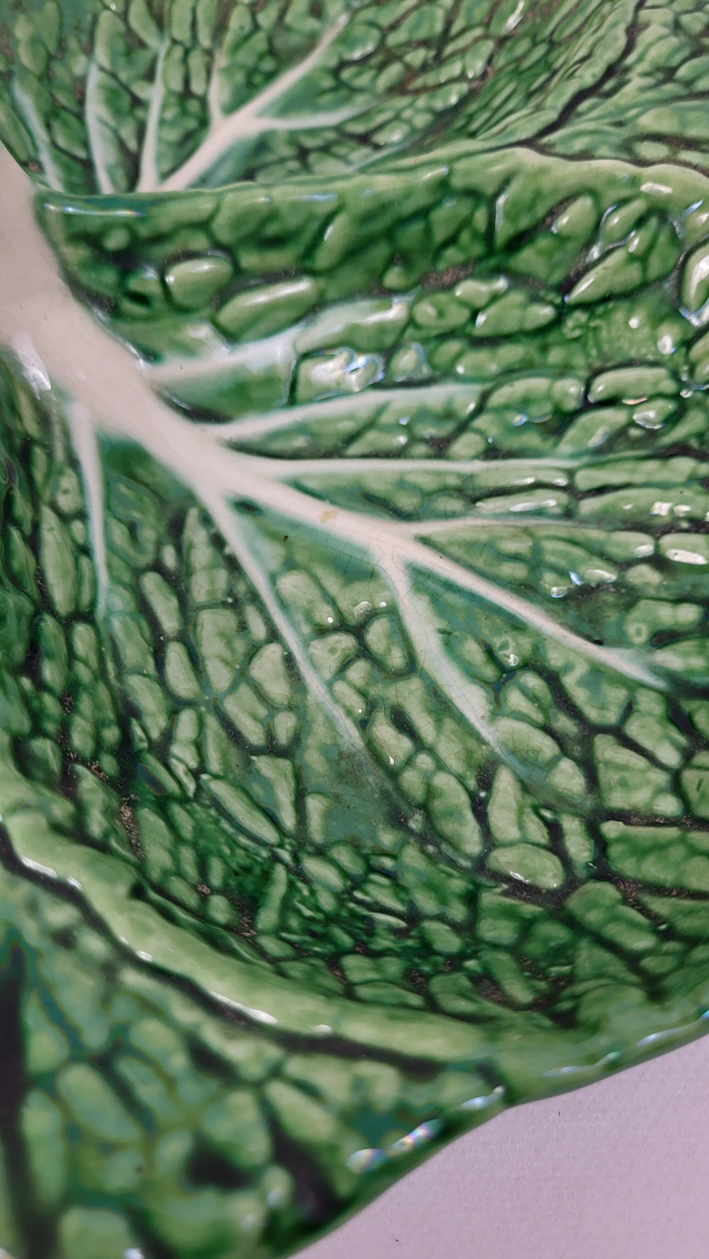 Ceramic dish with cabbage leaf compartments