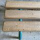 Vintage wood kindergarten bench and tubular structure in long