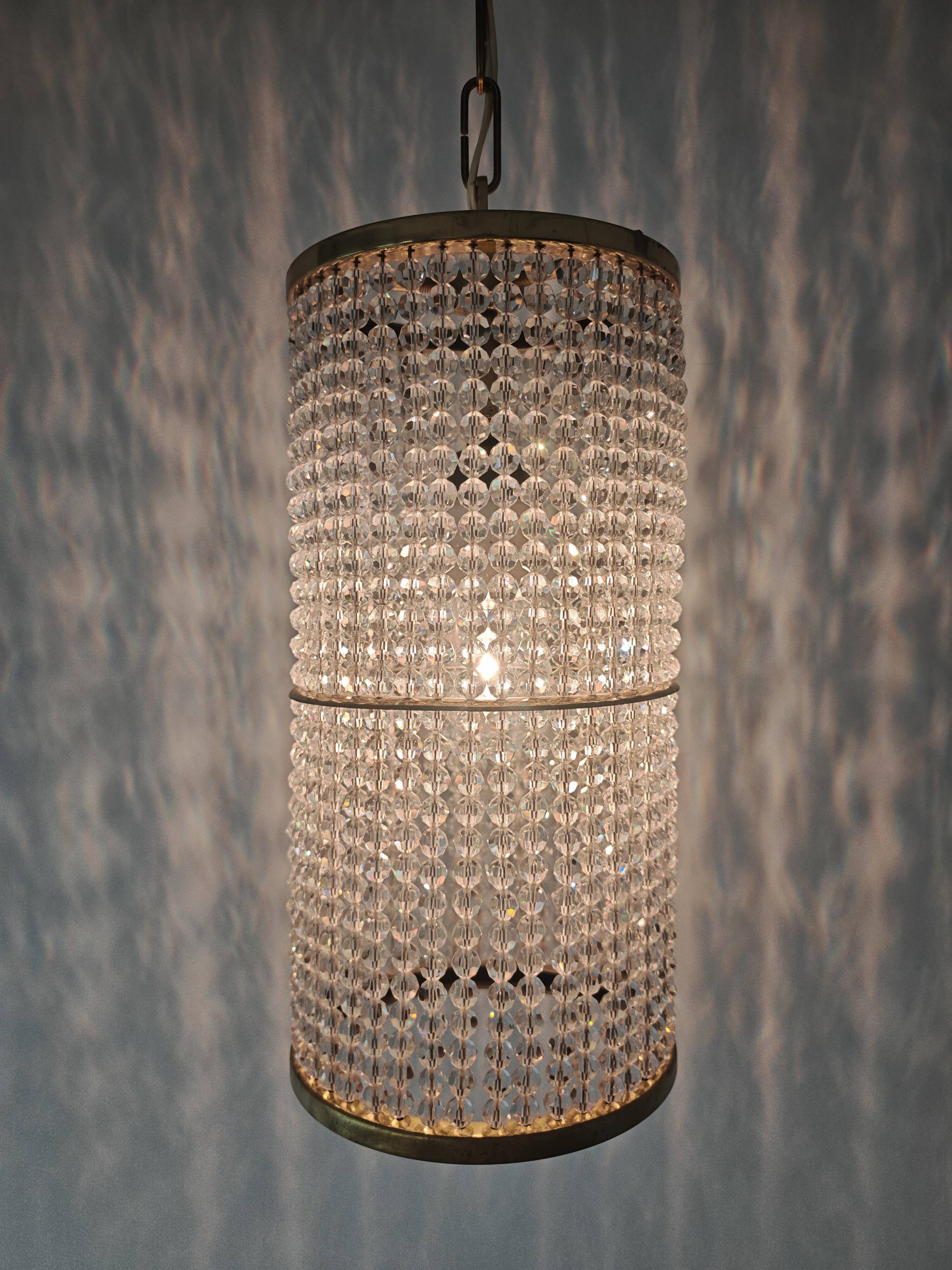 Set of 3 cylindrical crystal chandeliers in mid-century modern style attributed to Lobmeyr.