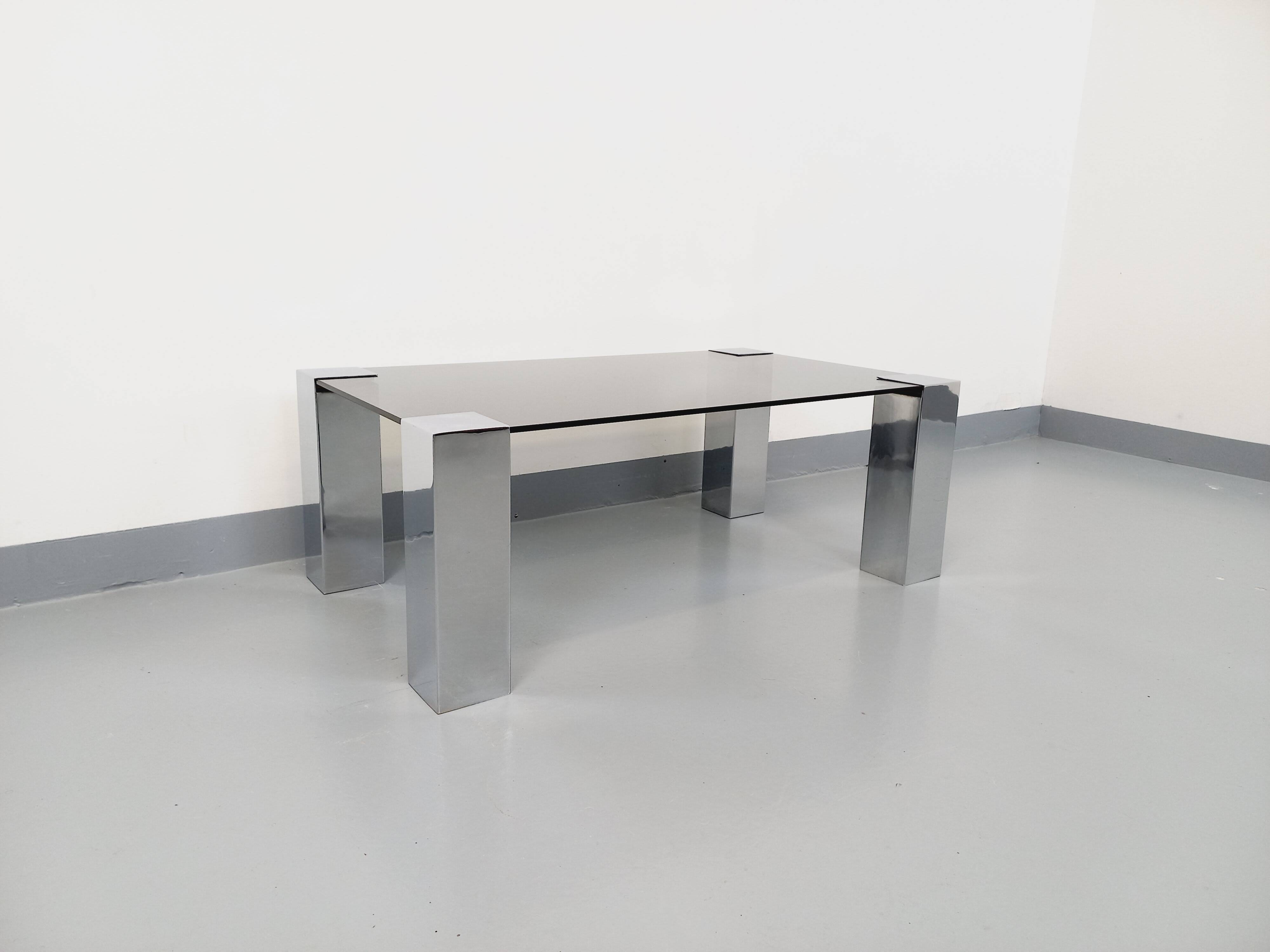 Vintage Italian coffee table Cidue in smoked glass and chrome metal from the 70s