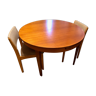 Round teak table with retractable extension