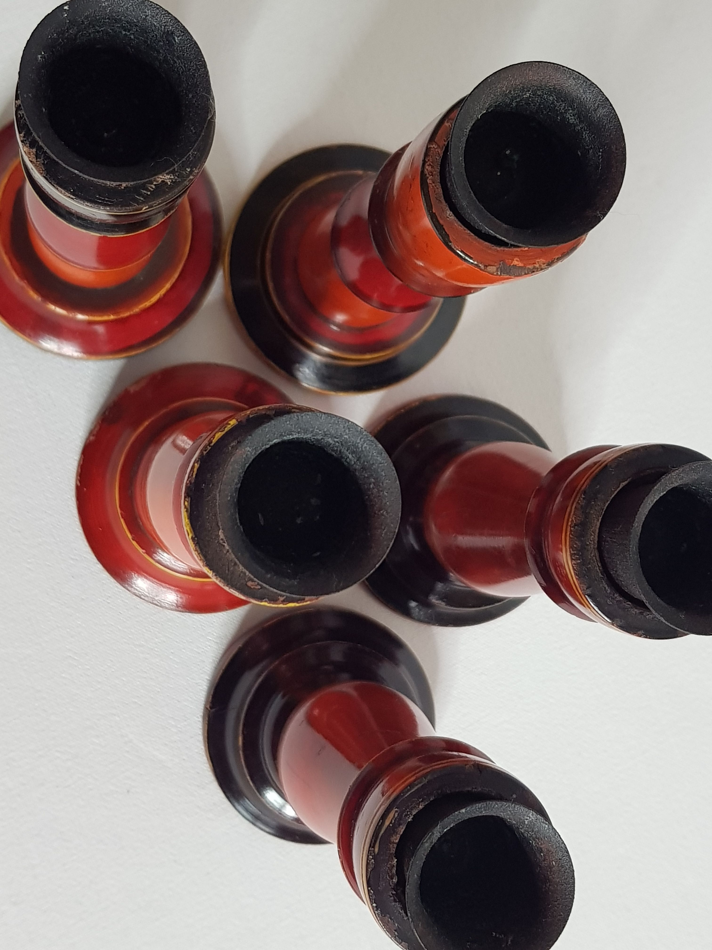 Set of five wooden candlesticks turned in the colors of "Pompeï"