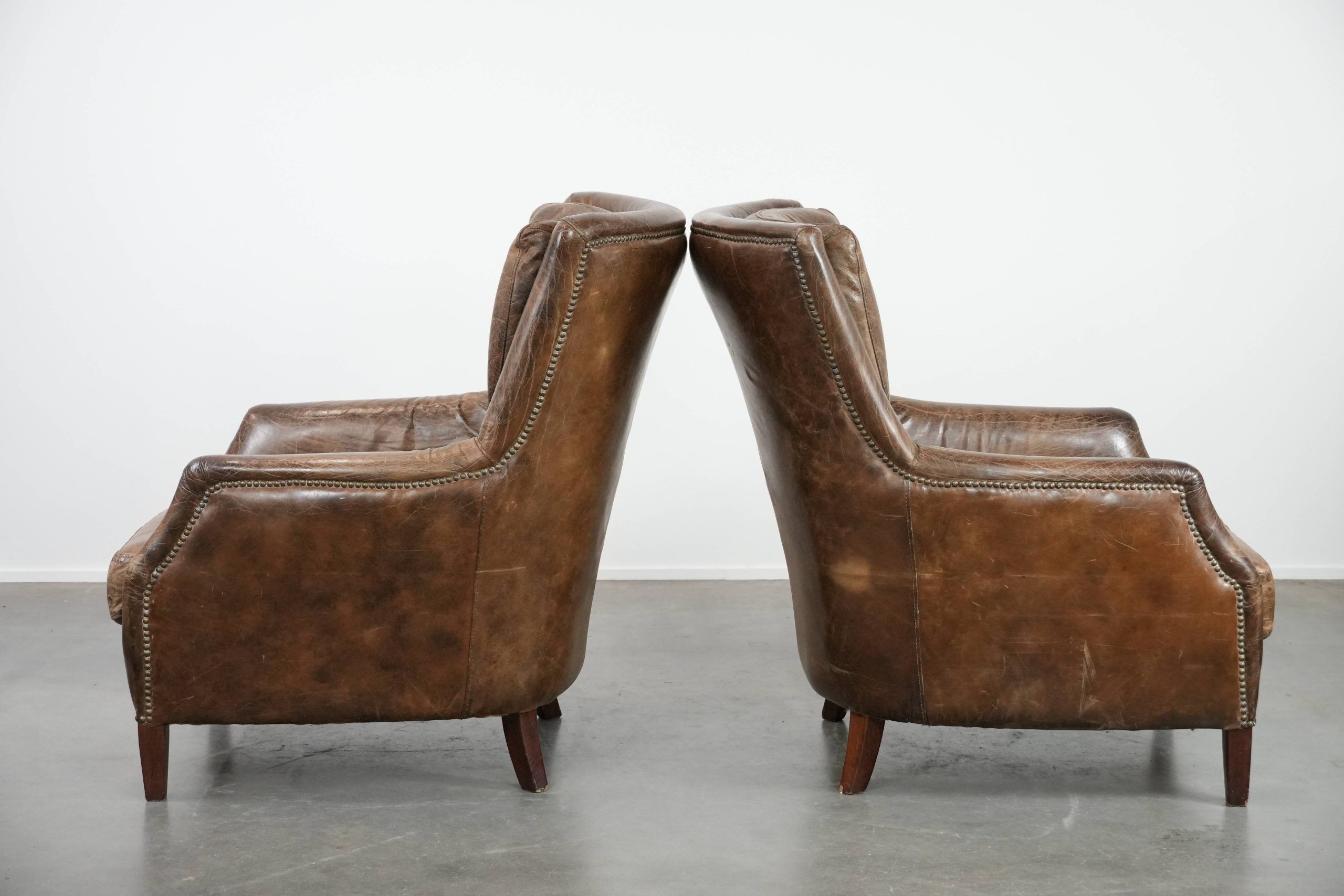 Very comfortable set of two vintage cowhide leather armchairs