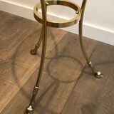 Neoclassical style tripod pedestal table in brass and round glass top in the taste of the House