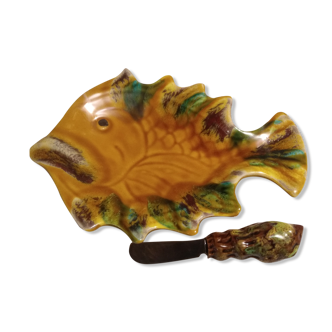 Buttermaker Vallauris fish and his knife