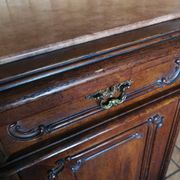 Buffet from the late 19th century with pink-brown marble in Louis XV style.