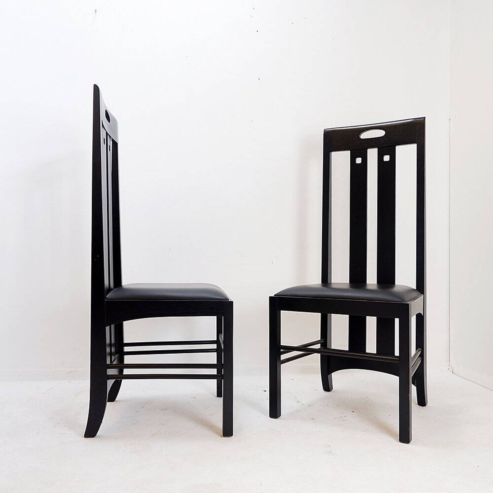 Pair of high-back chairs 'Ingram' by Charles Rennie Mackintosh for Cassina, 1980s