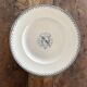 Round iron earth dish monogram “N” KG Lunéville