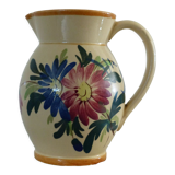 Old pitcher, pot to ance, faience, floral decoration.