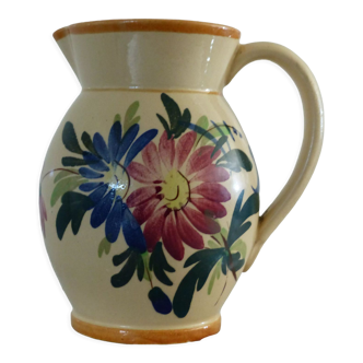 Old pitcher, pot to ance, faience, floral decoration.