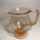 Pink pitcher in bubble glass