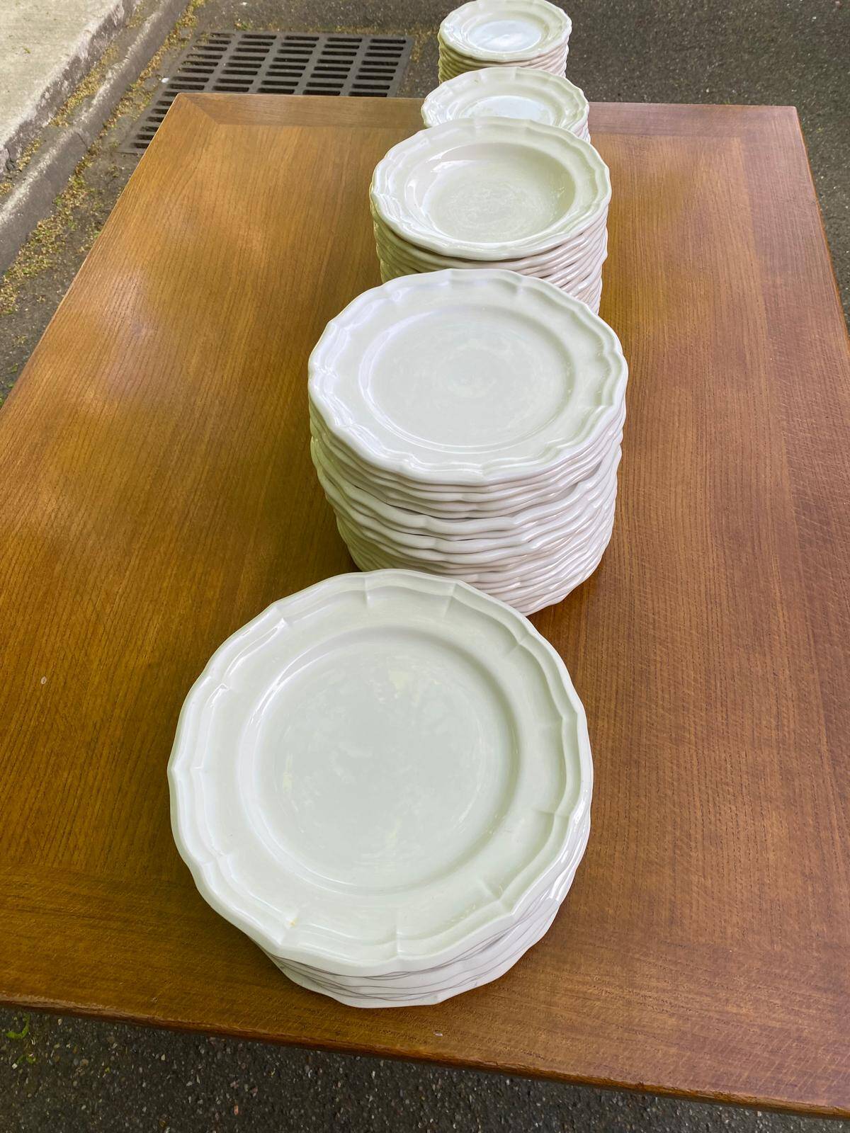 Service of 84 vintage white porcelain plates.
