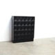 Black brutalist bar cabinet