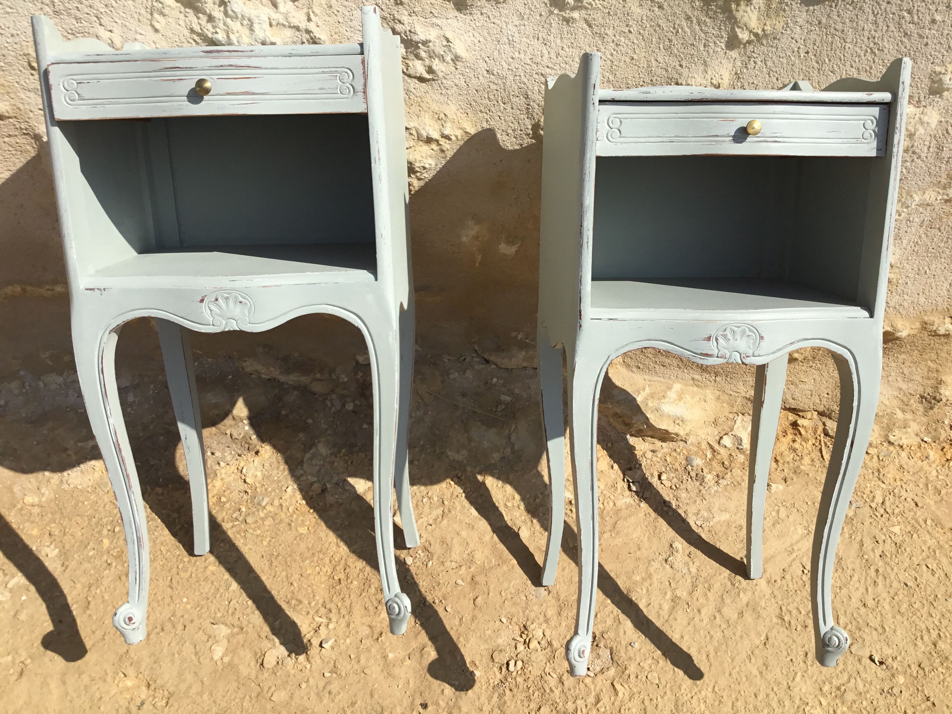 Pair of patinated Louis XV style bedside tables