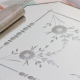 Top mirror to Central décor of flowers.