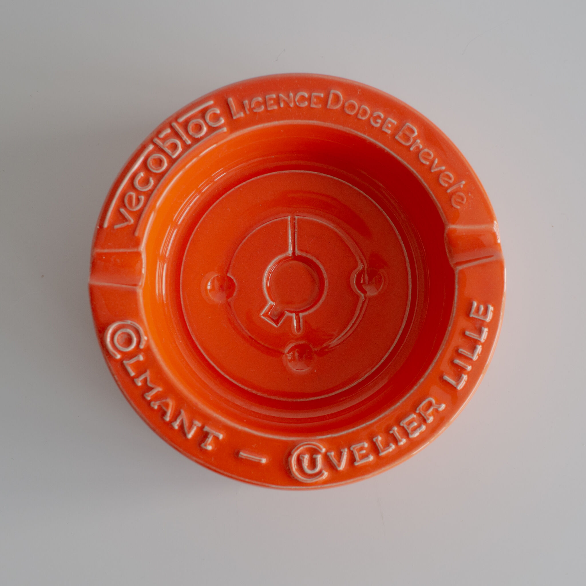 Orange ceramic ashtray