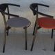 4 Gondola-style chairs with a sturdy metal frame and faux leather for