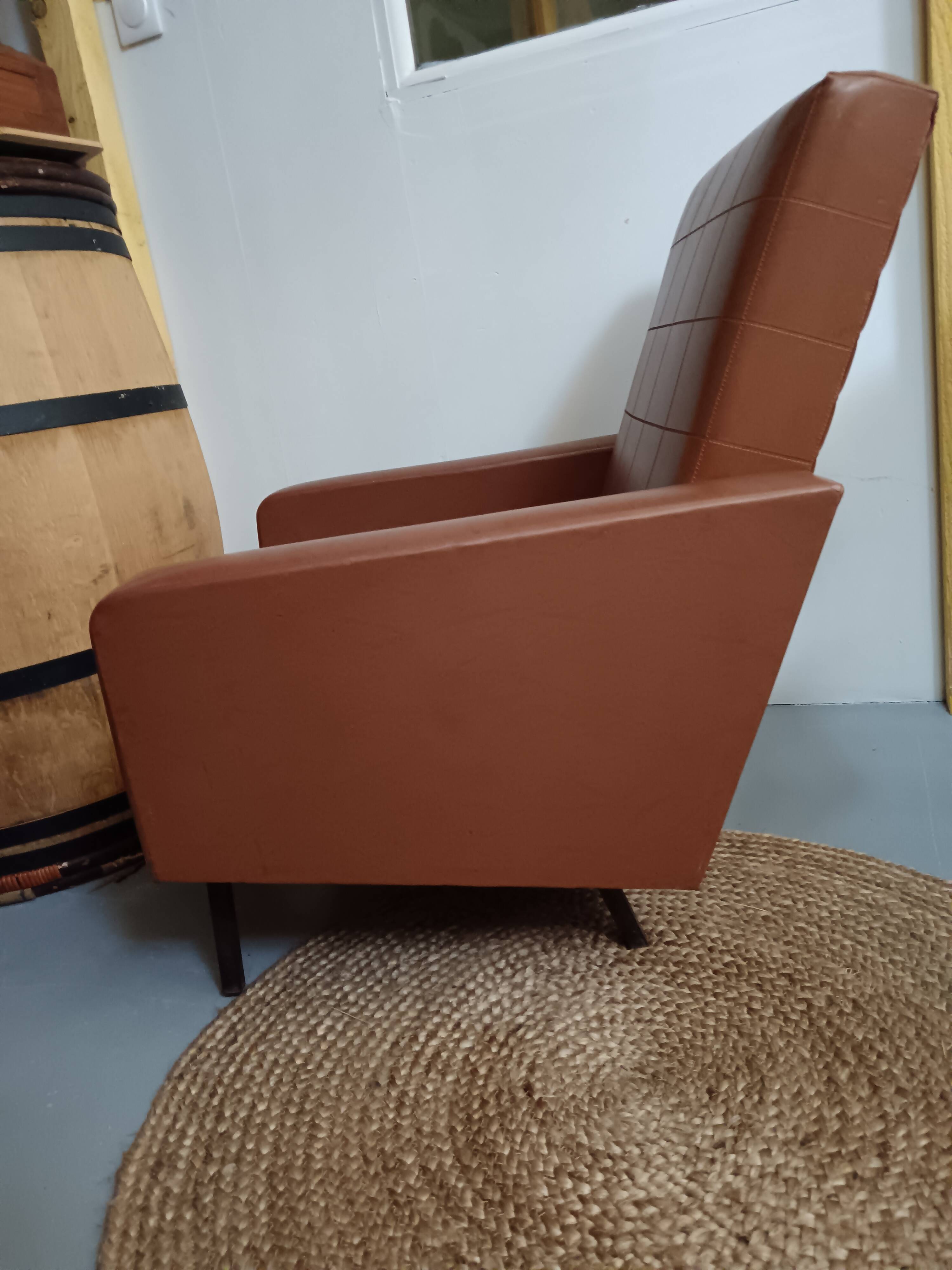 Fauteuil en skaï marron