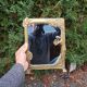 Art Nouveau mirror in gilded brass with a woman figure emerging from a vintage frame