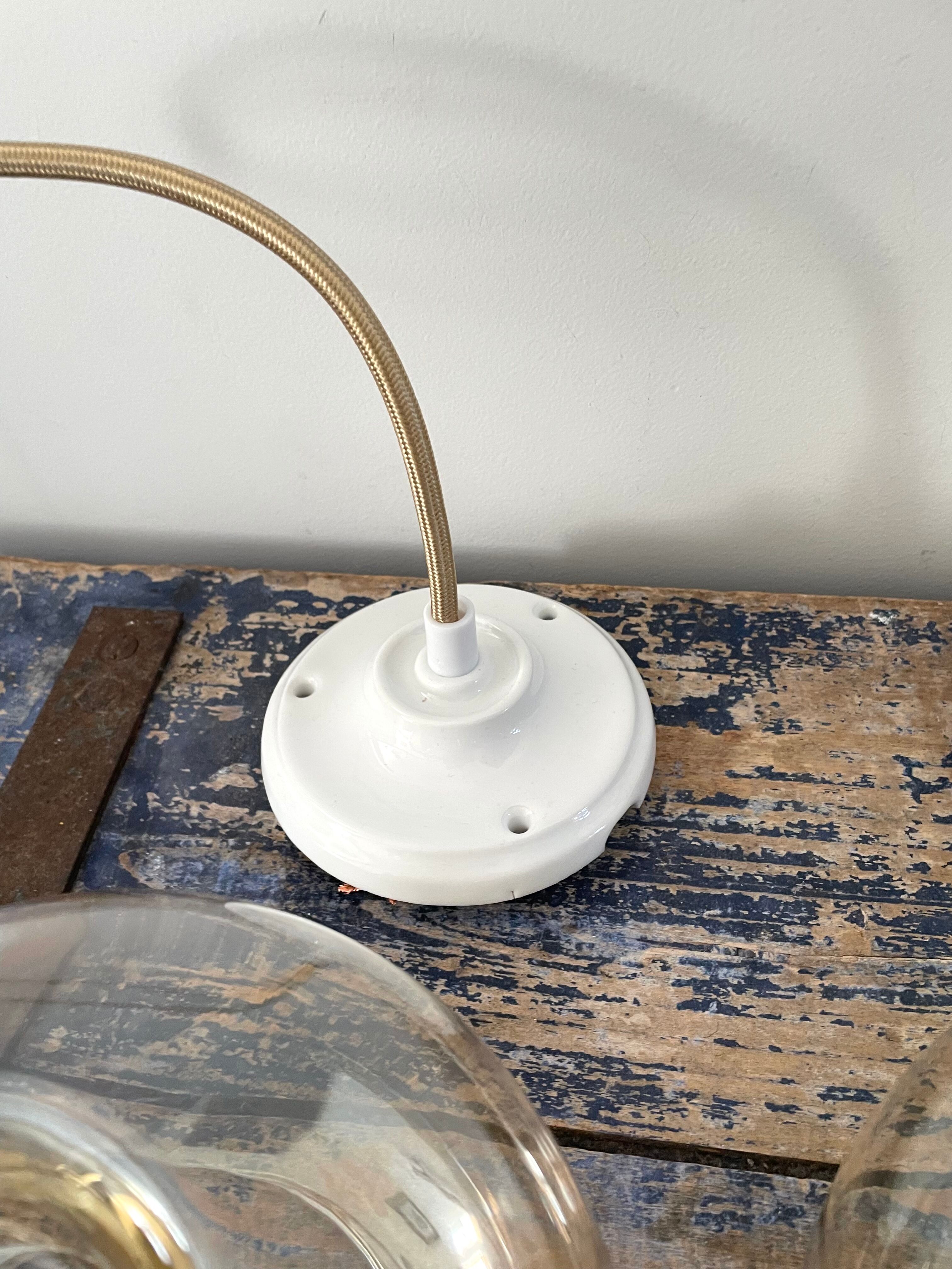 Set of three new electrified golden glass pendant lamps