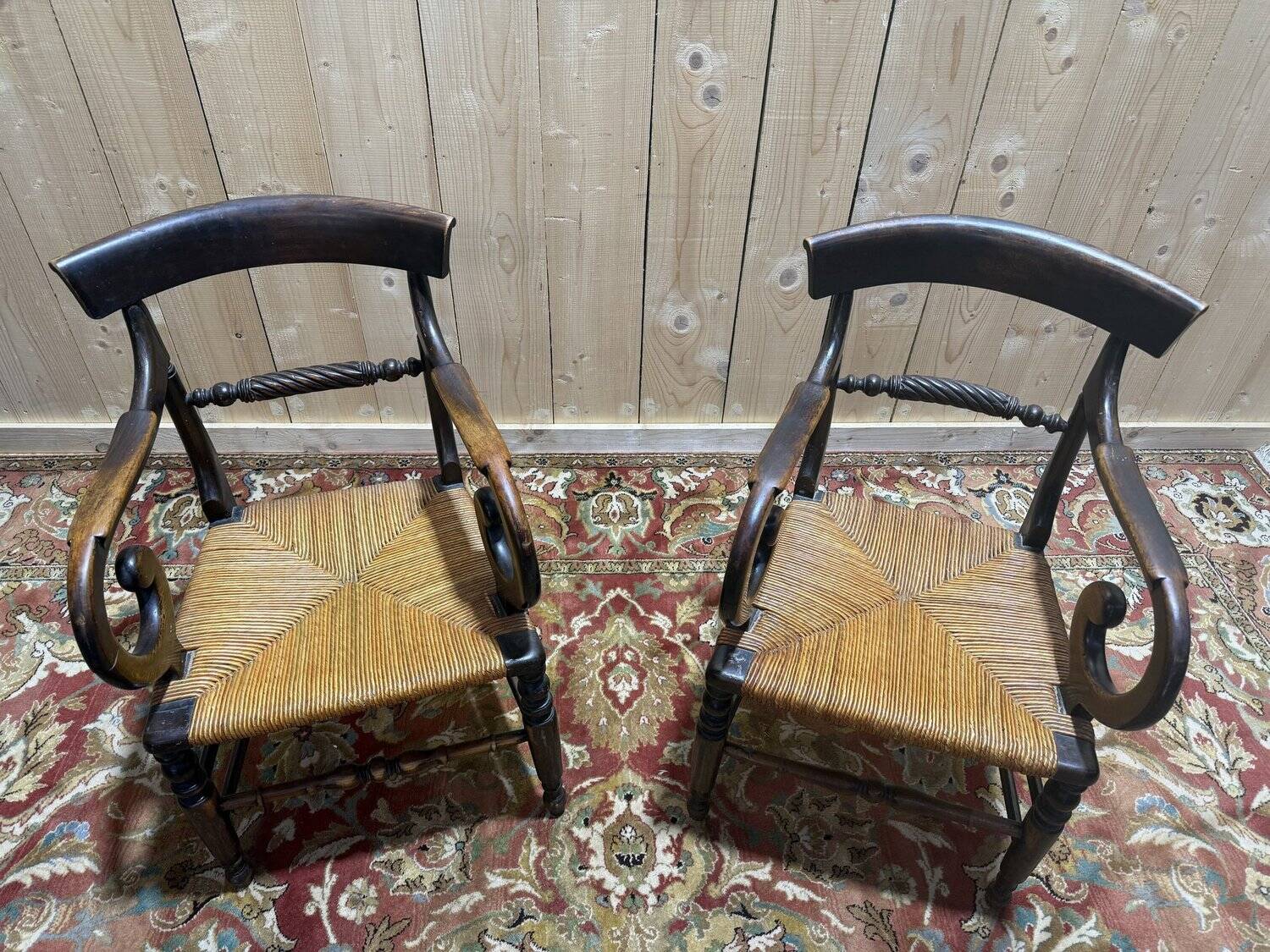 Pair of rustic straw-seated armchairs