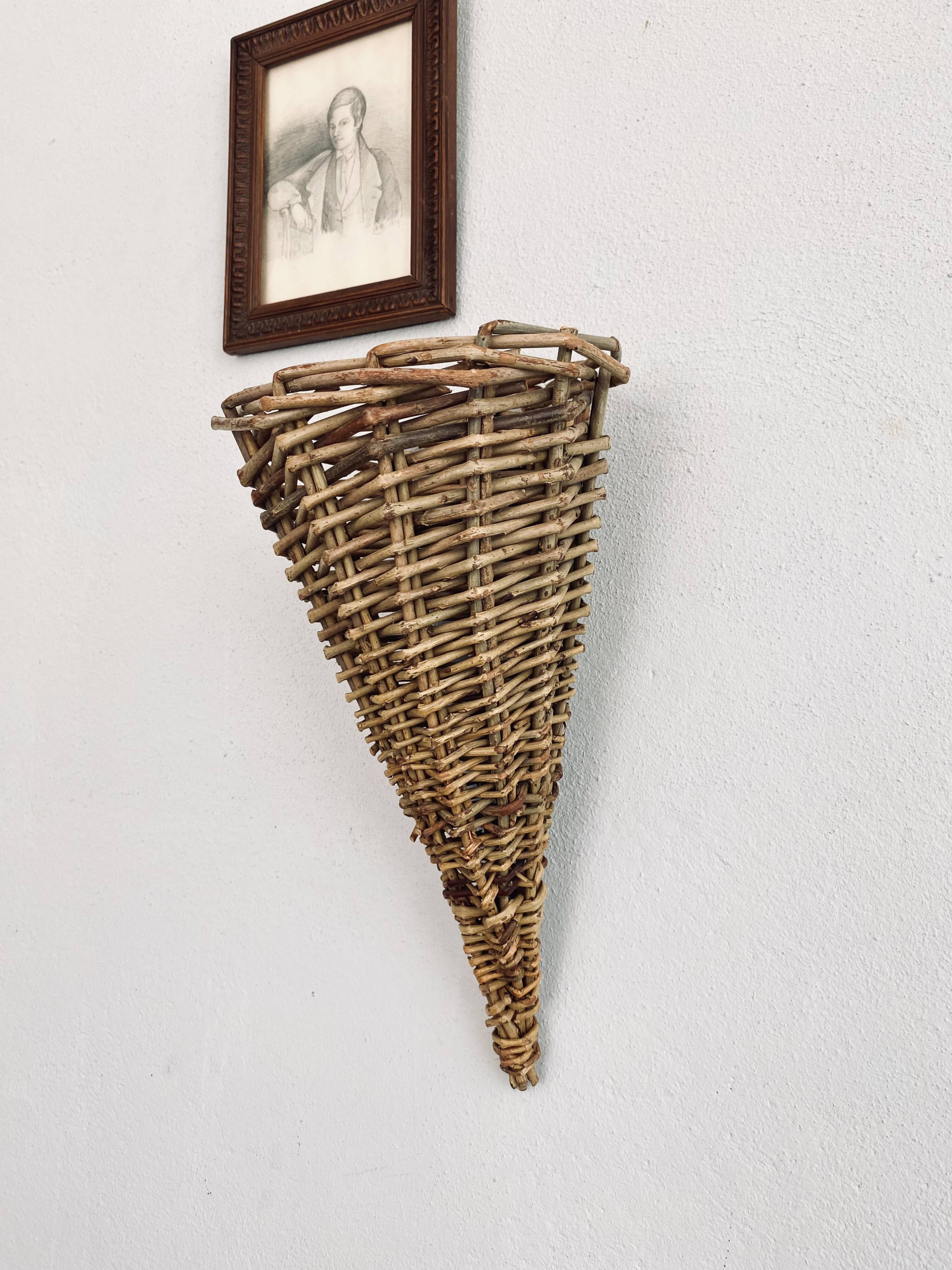 Brown wicker basket, wall decoration